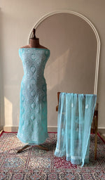 Aqua faux georgette set on the mannequin with its dupatta
