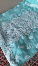 Fine chikankari on panel and motifs on the aqua faux georgette