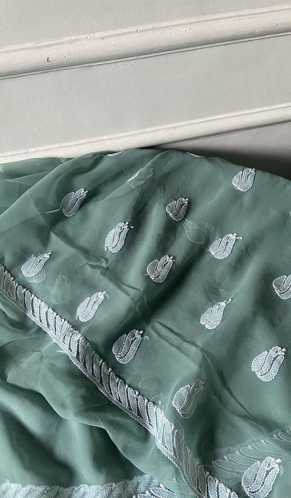 border and hem work on sage green faux georgette