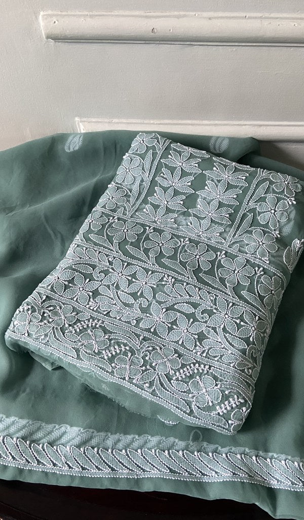 sage green chikankari set folded, worked panel on top