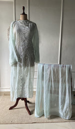green pure kota cotton chikankari set on the mannequin with the dupatta