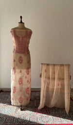 The set on the mannequin with its dupatta beside it