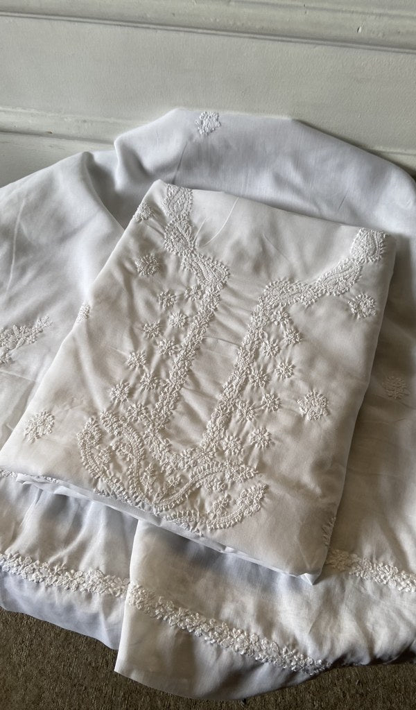 white cotton kurta piece folded, fine chikankari with haath ki jaali