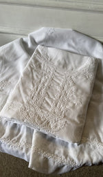 white cotton kurta piece folded, fine chikankari with haath ki jaali