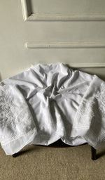 Bottom fabric draped over the stool