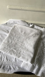The folded set, kurta on top