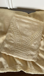 Folded cream muslin kurta, second view
