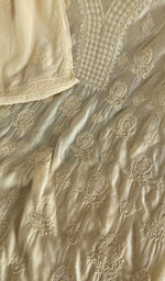 Fine chikankari on the cream muslin