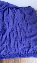 Hand embroidery on indigo muslin