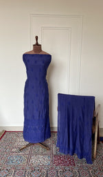 Indigo muslin set on the mannequin with its dupatta