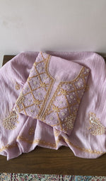 Folded purple pure mul chanderi kurta piece with chikankari on the panel