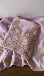 Folded kurta piece and dupatta, chikankari along the hem