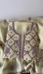 Folded kurta piece and dupatta, chikankari along the hem