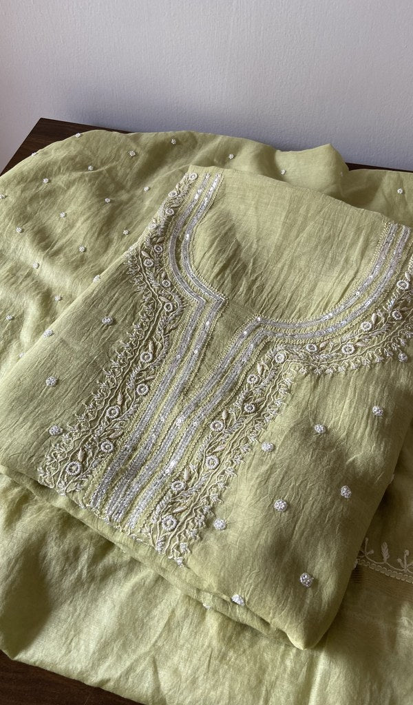Pale Lime pure mul chanderi kurta piece folded, fine chikankari in view