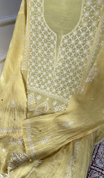 Load image into Gallery viewer, close view of the hand embroidery, yellow pure mul chanderi