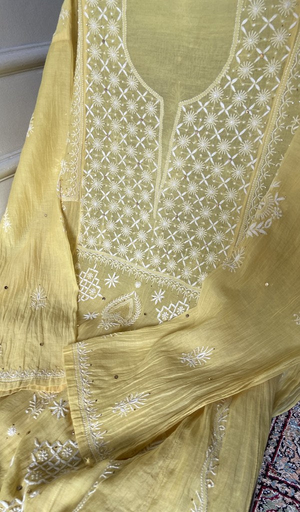 close view of the hand embroidery, yellow pure mul chanderi