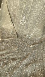 Close view of the beige kurta fabric