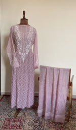 Dusty lilac mul chanderi set on the mannequin with its dupatta