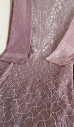 Dusty lilac mul chanderi laid flat on the table