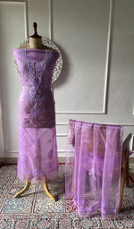 Purple organza chikankari suit set on the mannequin, dupatta alongside