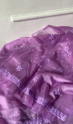 Detail of the embroidery on the purple organza