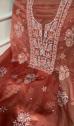 Load image into Gallery viewer, Close view of the chikankari on the rust kurta