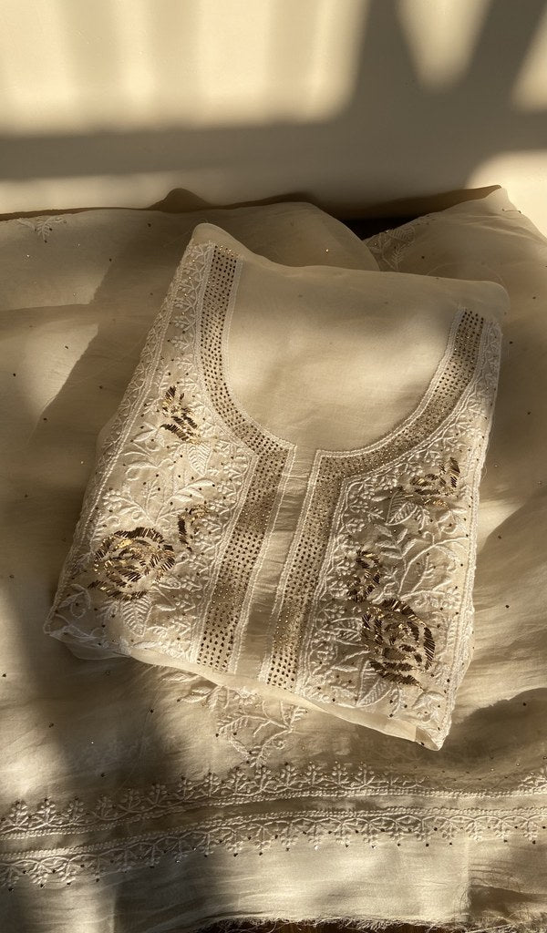 Folded ivory organza silk kurta, gala and neckline work