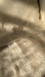 Hand embroidery on ivory organza silk