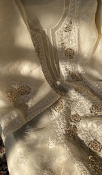 Ivory organza silk laid flat on the table