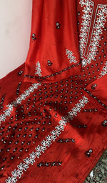 Hem and border of the red dupatta