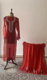 Red pure mul chanderi chikankari suit set on the mannequin with its dupatta