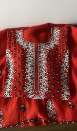 Folded kurta piece and dupatta, chikankari along the hem