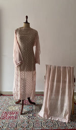 Pink pure mul chanderi chikankari suit set on the mannequin with its dupatta