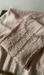 Folded kurta piece and dupatta, chikankari in cream thread along the hem
