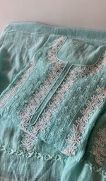 Load image into Gallery viewer, Aqua pure mul chanderi kurta piece folded, fine chikankari in view
