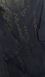 Second folded view of the black kurta piece