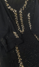 Kurta laid flat with the dupatta, fine chikankari on panel