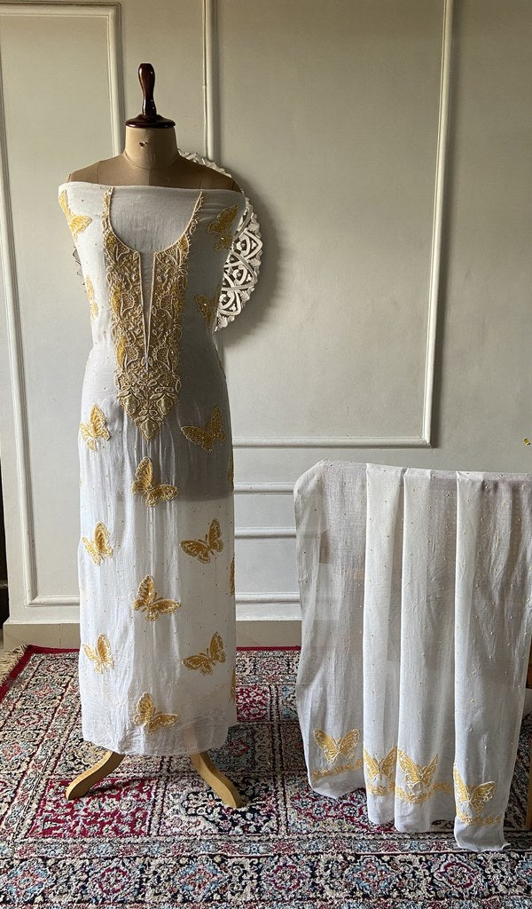 White pure mul chanderi chikankari 2 pc unstitched suit set laid out