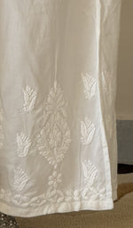 Hem embroidery on the white palazzo, up close
