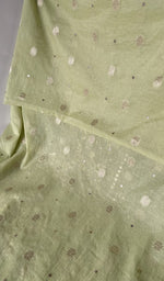 The kurta piece folded on the carpet
