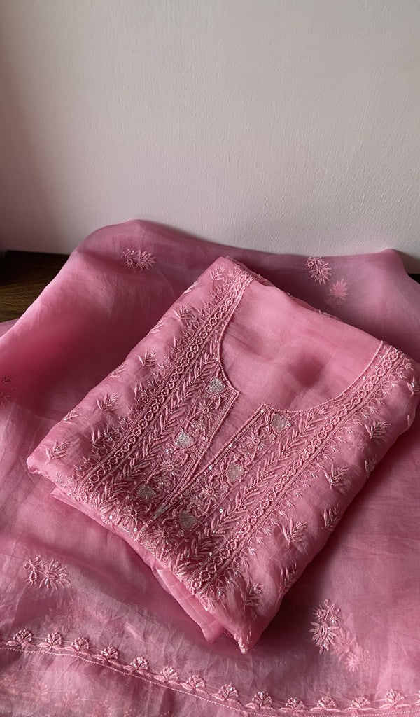 Pink pure organza silk kurta piece folded, fine jaaldar do taar chikankari