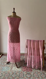 The set on the mannequin with its dupatta beside it