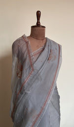 Grey saree on the mannequin, close view