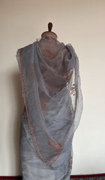 Embroidery on the grey saree, close view
