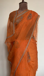Tangerine orange organza silk saree, lower half