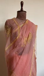 Coral saree on the mannequin, close view