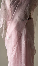 Baby pink saree on the mannequin, close view