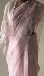 Fine do taar chikankari on border and palla on the baby pink saree