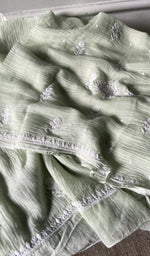 border and hem of the green kurta piece