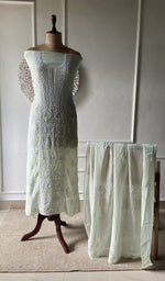 green pure mul chanderi chikankari set on the mannequin with the dupatta